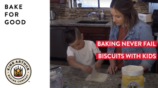 Libby and Ridge cutting biscuit dough